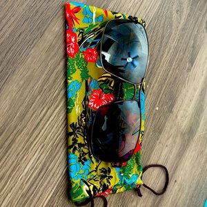 Maui Jim Manu sunglasses in brown.  Lightly worn.  No scratches or damage.